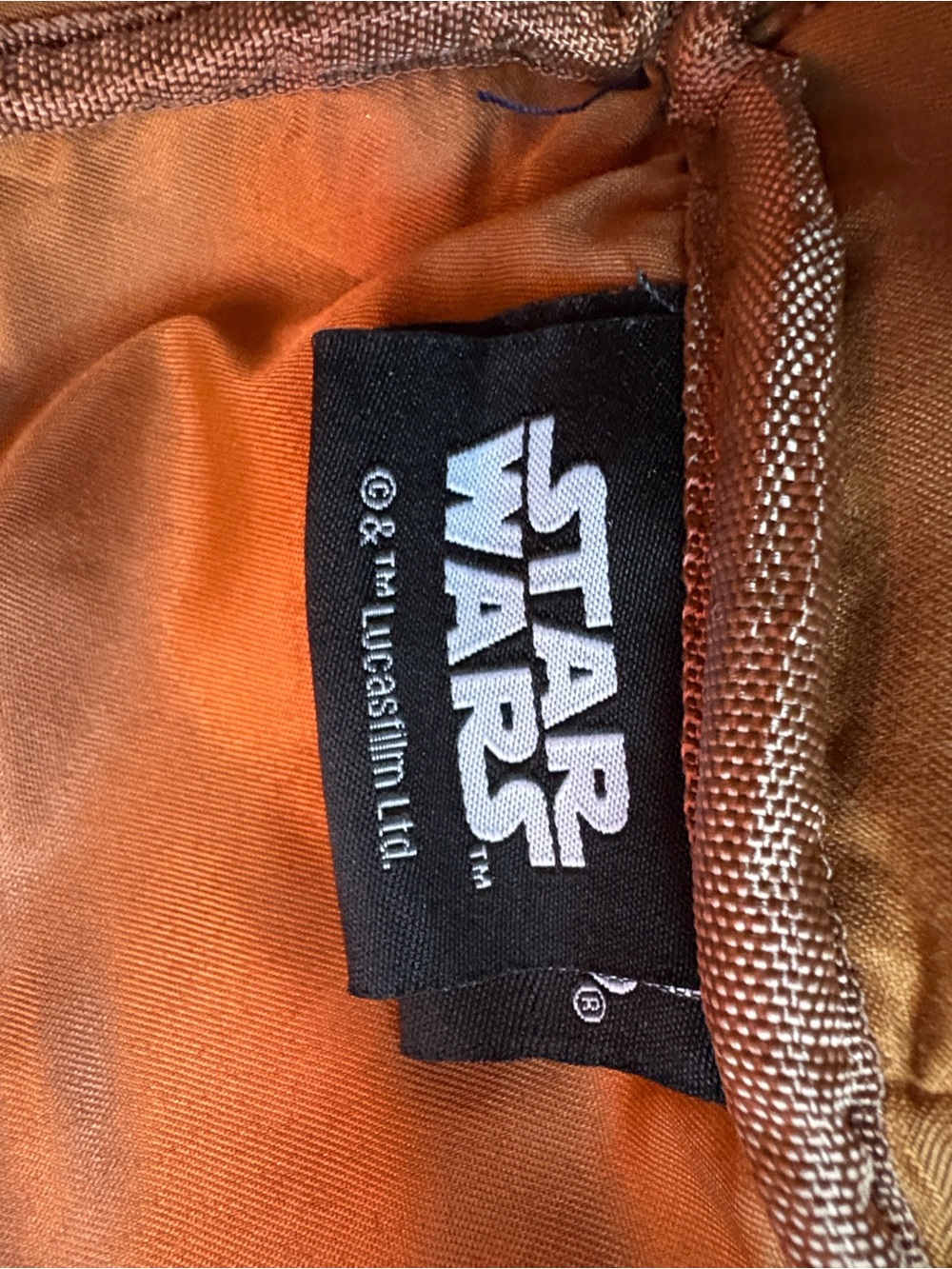 Cool Star Wars backpack. Exterior wallet size snap pocket. Interior zipper.